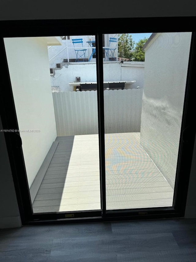 2160 NW 30th St, Miami, FL 33142 - doorway to outside with wood finished floors