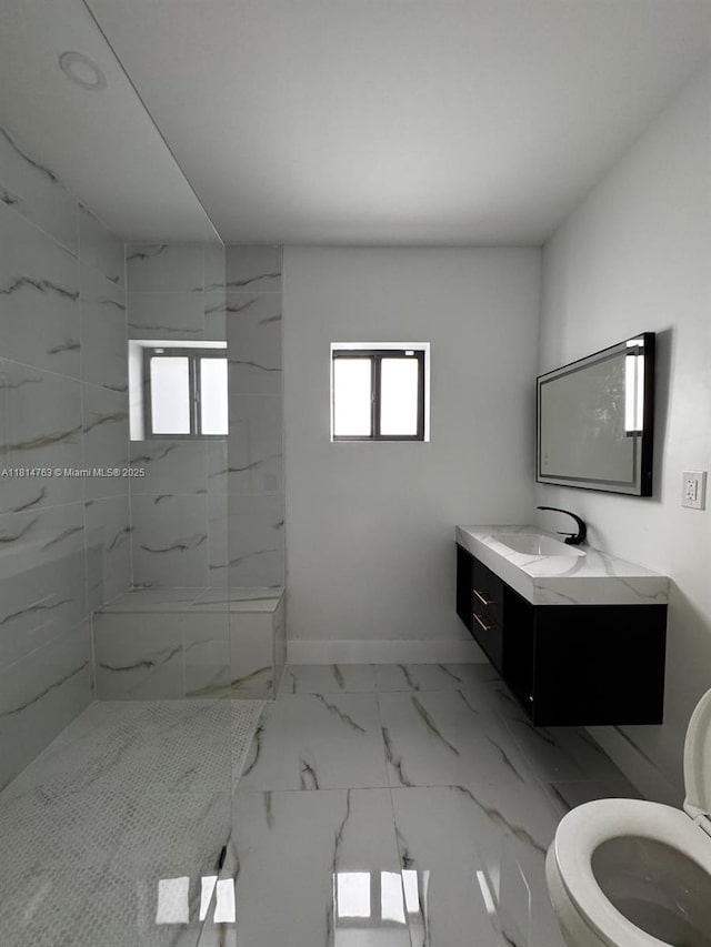 2160 NW 30th St, Miami, FL 33142 - full bath featuring healthy amount of natural light, vanity, marble look tile flooring, and a marble finish shower