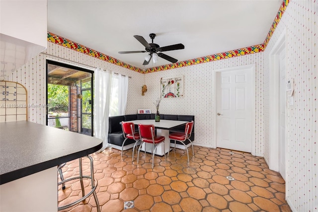 9728 SW 135th Ter, Miami, FL 33176 - dining space with wallpapered walls and ceiling fan