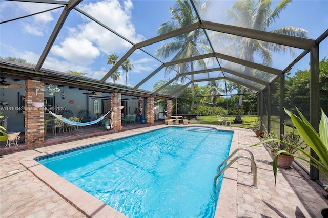9728 SW 135th Ter, Miami, FL 33176 - swimming pool with a ceiling fan, a patio area, and glass enclosure