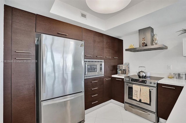 150 Sunny Isles Blvd Unit 1-1803, Sunny Isles Beach, FL 33160 - kitchen featuring appliances with stainless steel finishes, wall chimney range hood, dark brown cabinets, open shelves, and light countertops