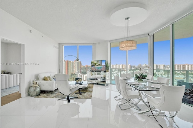 150 Sunny Isles Blvd Unit 1-1803, Sunny Isles Beach, FL 33160 - dining area with floor to ceiling windows and a textured ceiling