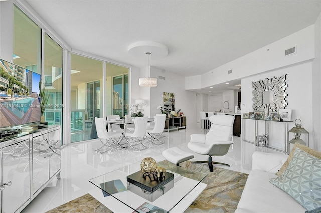 150 Sunny Isles Blvd Unit 1-1803, Sunny Isles Beach, FL 33160 - living area with a chandelier