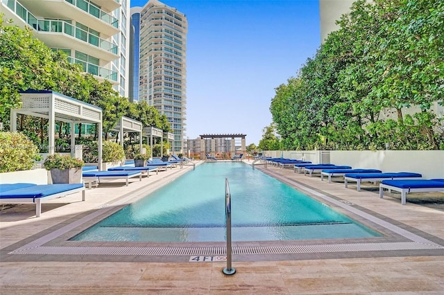 150 Sunny Isles Blvd Unit 1-1803, Sunny Isles Beach, FL 33160 - community pool featuring a patio area