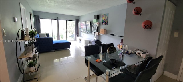 5773 Washington St Unit J2, Hollywood, FL 33023 - dining space with a textured ceiling