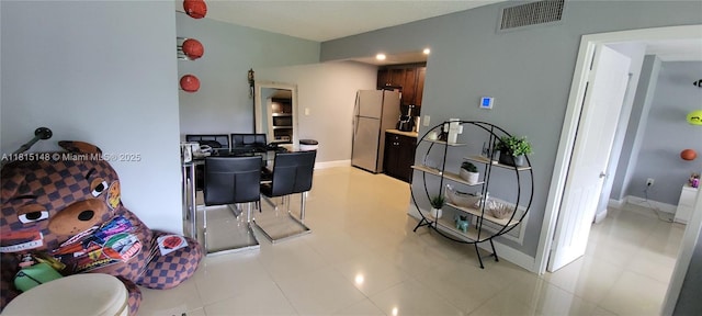 5773 Washington St Unit J2, Hollywood, FL 33023 - kitchen with freestanding refrigerator and light countertops