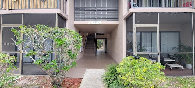 5773 Washington St Unit J2, Hollywood, FL 33023 - doorway to property featuring stucco siding