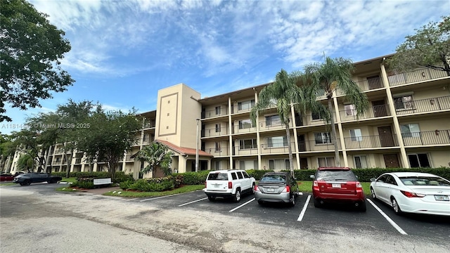 1351 SW 141st Ave Unit 407G, Pembroke Pines, FL 33027 - view of apartment building / complex featuring uncovered parking