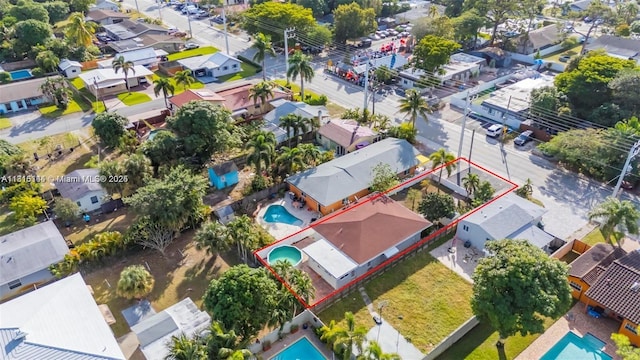 735 NE 38th St, Oakland Park, FL 33334 - aerial perspective of suburban area with a pool area and property parcel outlined