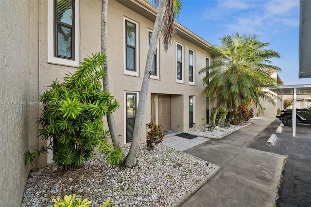 4803 SW Santa Barbara Ct Unit 5, Cape Coral, FL 33914 - view of side of property with stucco siding