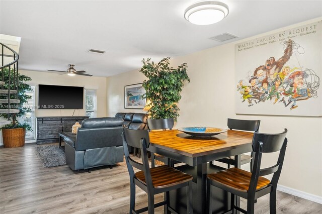 4803 SW Santa Barbara Ct Unit 5, Cape Coral, FL 33914 - dining area featuring wood finished floors and ceiling fan