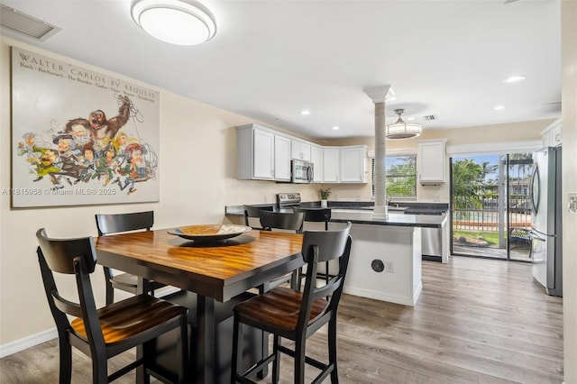 4803 SW Santa Barbara Ct Unit 5, Cape Coral, FL 33914 - dining space featuring light wood-type flooring and recessed lighting