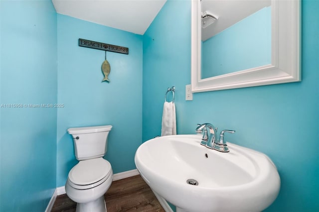 4803 SW Santa Barbara Ct Unit 5, Cape Coral, FL 33914 - bathroom featuring a sink and wood finished floors