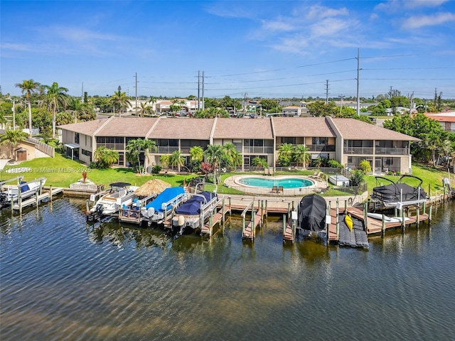 4803 SW Santa Barbara Ct Unit 5, Cape Coral, FL 33914 - dock area featuring boat lift and a water view