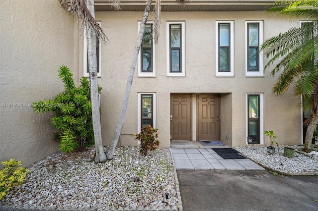 4803 SW Santa Barbara Ct Unit 5, Cape Coral, FL 33914 - property entrance with stucco siding