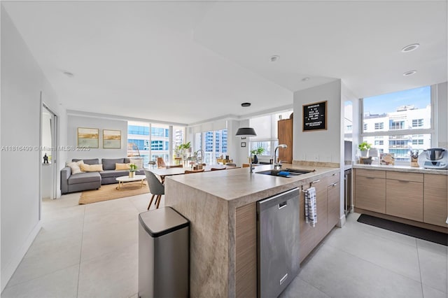 1155 Brickell Bay Dr Unit 3002, Miami, FL 33131 - kitchen featuring dishwasher, modern cabinets, light countertops, a peninsula, and open floor plan