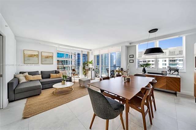 1155 Brickell Bay Dr Unit 3002, Miami, FL 33131 - dining area featuring light tile patterned floors and a city view