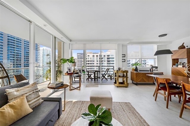 1155 Brickell Bay Dr Unit 3002, Miami, FL 33131 - living room featuring a view of city, plenty of natural light, and light tile patterned flooring