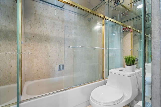 1111 Crandon Blvd Unit B506, Key Biscayne, FL 33149 - bathroom featuring toilet and shower / bath combination with glass door