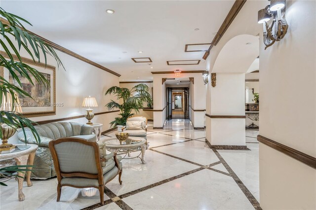 18151 NE 31st Ct Unit 205, Aventura, FL 33160 - community lobby with ornamental molding and recessed lighting