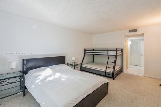 18151 NE 31st Ct Unit 205, Aventura, FL 33160 - bedroom with carpet and a textured ceiling