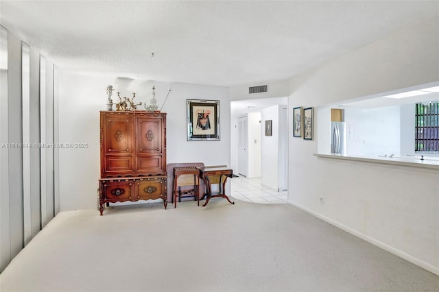 9510 Seagrape Dr Unit 101, Davie, FL 33324 - living area featuring light carpet and baseboards
