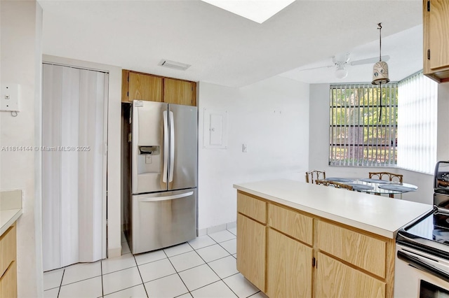 9510 Seagrape Dr Unit 101, Davie, FL 33324 - kitchen featuring stainless steel refrigerator with ice dispenser, range with electric cooktop, light countertops, light tile patterned floors, and light brown cabinets