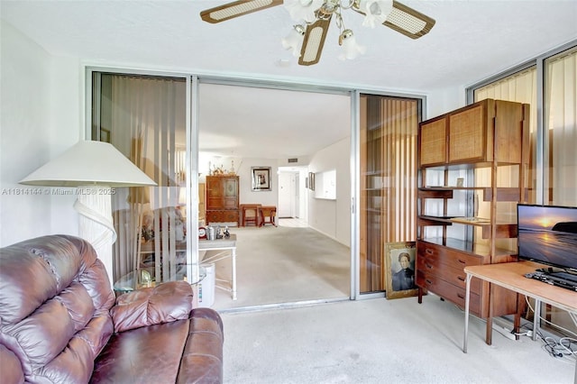 9510 Seagrape Dr Unit 101, Davie, FL 33324 - living room featuring ceiling fan and light carpet