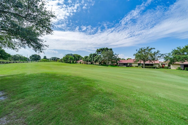 9510 Seagrape Dr Unit 101, Davie, FL 33324 - view of community featuring view of golf course and a lawn