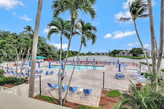 9510 Seagrape Dr Unit 101, Davie, FL 33324 - community pool featuring a patio and a water view