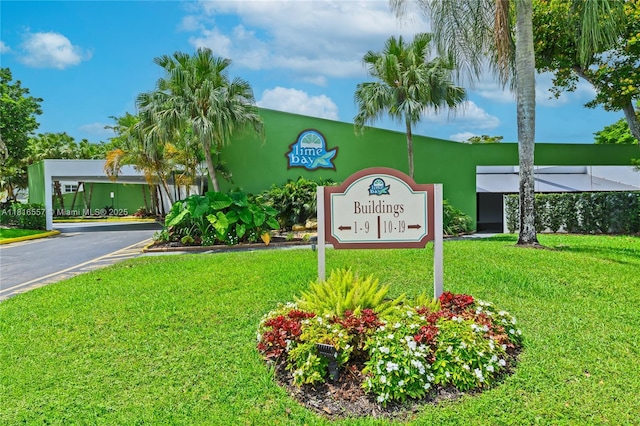 9091 Lime Bay Blvd Unit 211, Tamarac, FL 33321 - community / neighborhood sign with a lawn