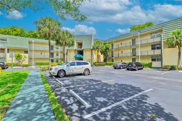 9091 Lime Bay Blvd Unit 211, Tamarac, FL 33321 - view of uncovered parking lot
