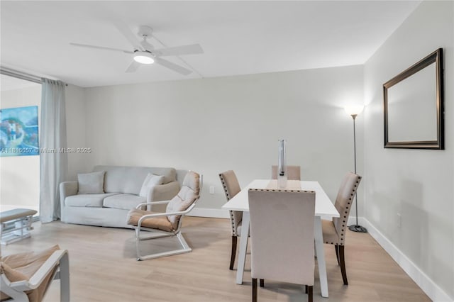 9091 Lime Bay Blvd Unit 211, Tamarac, FL 33321 - living room with light wood-style flooring, ceiling fan, and baseboards