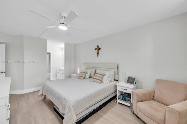 9091 Lime Bay Blvd Unit 211, Tamarac, FL 33321 - bedroom with light wood-style floors, a ceiling fan, baseboards, and ensuite bathroom