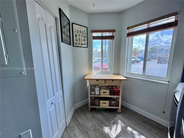 120 SW 109th Ave Unit 3, Sweetwater, FL 33174 - bedroom with wood finished floors, multiple windows, and baseboards