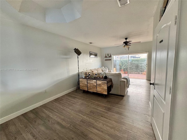 120 SW 109th Ave Unit 3, Sweetwater, FL 33174 - living room with baseboards, ceiling fan, and dark wood-type flooring