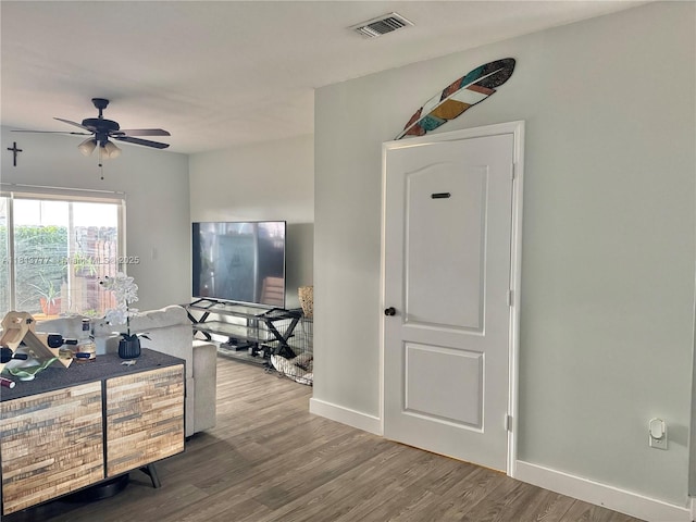 120 SW 109th Ave Unit 3, Sweetwater, FL 33174 - interior space featuring wood finished floors, a ceiling fan, and baseboards