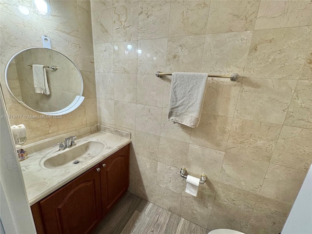 120 SW 109th Ave Unit 3, Sweetwater, FL 33174 - bathroom featuring vanity, tile walls, and wood finished floors