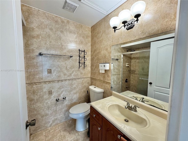 120 SW 109th Ave Unit 3, Sweetwater, FL 33174 - bathroom with tile walls, vanity, a tile shower, toilet, and tile patterned floors