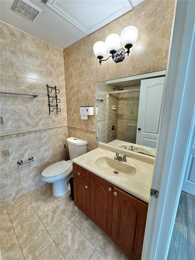 120 SW 109th Ave Unit 3, Sweetwater, FL 33174 - full bathroom with vanity, tiled shower, tile walls, toilet, and tile patterned floors