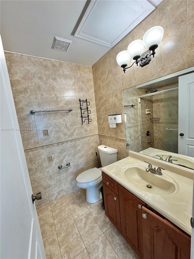 120 SW 109th Ave Unit 3, Sweetwater, FL 33174 - full bathroom with tile walls, tile patterned floors, toilet, vanity, and a tile shower