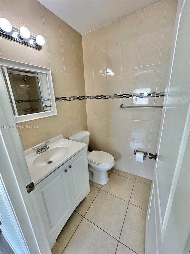 120 SW 109th Ave Unit 3, Sweetwater, FL 33174 - bathroom with tile walls, vanity, toilet, and tile patterned floors