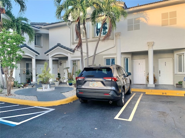 120 SW 109th Ave Unit 3, Sweetwater, FL 33174 - townhome / multi-family property featuring stucco siding, uncovered parking, and a tile roof
