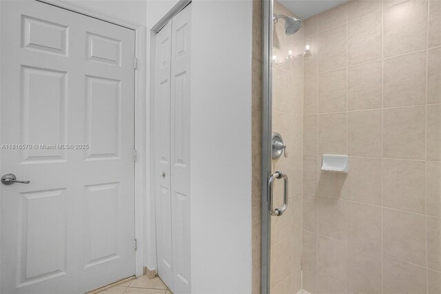 628 SE 37th Pl, Homestead, FL 33033 - bathroom featuring a closet, a shower stall, and tile patterned floors
