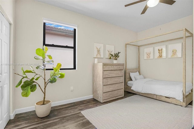 628 SE 37th Pl, Homestead, FL 33033 - bedroom featuring wood finished floors, baseboards, and ceiling fan