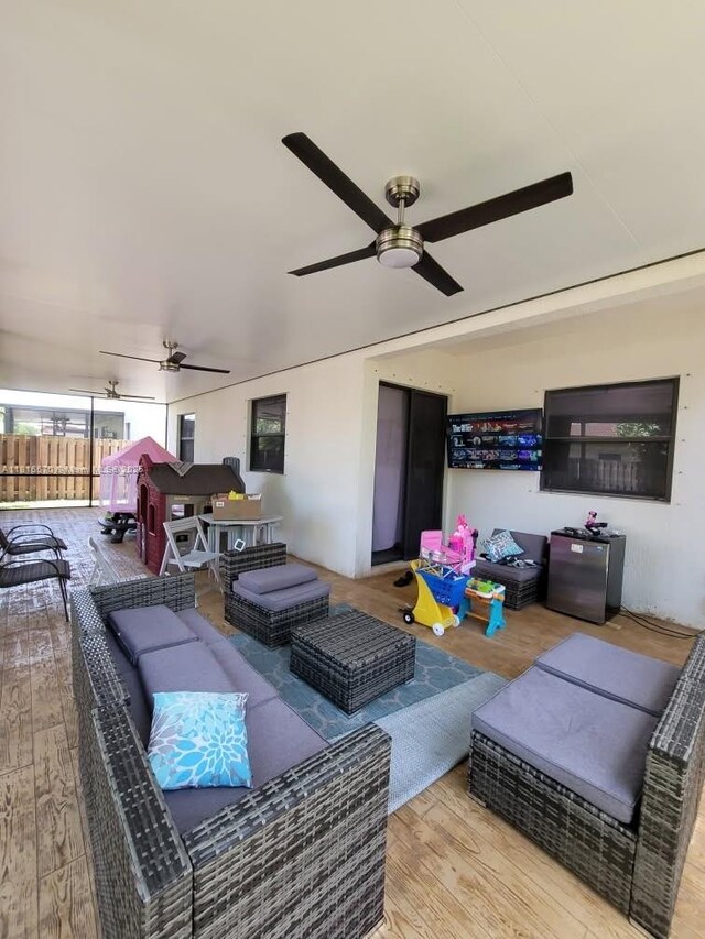 628 SE 37th Pl, Homestead, FL 33033 - living room featuring ceiling fan and wood finished floors