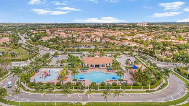 628 SE 37th Pl, Homestead, FL 33033 - aerial view of residential area with a pool and a large body of water