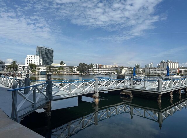 430 Golden Isles Dr Unit 301, Hallandale Beach, FL 33009 - dock area featuring a water view