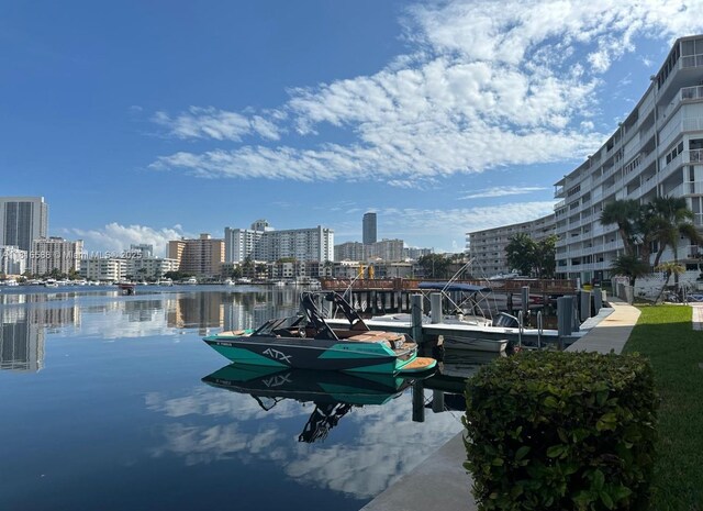 430 Golden Isles Dr Unit 301, Hallandale Beach, FL 33009 - water view with nearby urban area and a dock