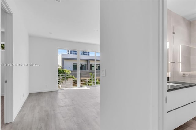 3122 Carter St, Miami, FL 33133 - hall with wood finished floors and baseboards